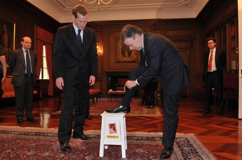 President Santos Lends His Leg